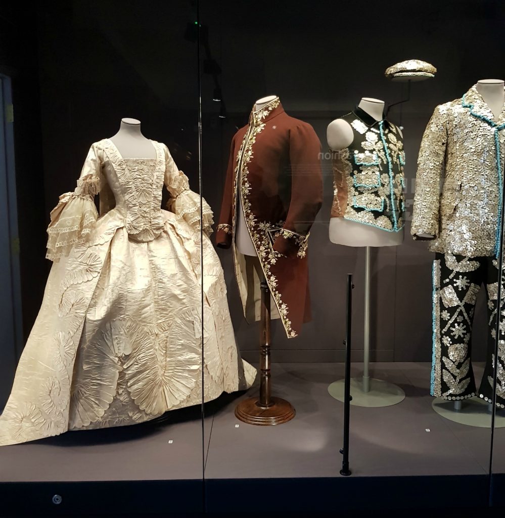 Some of the dresses in the fashion gallery including an opulent court or wedding dress - my review of a free day out in London, visiting Gunnersbury Park Museum with kids