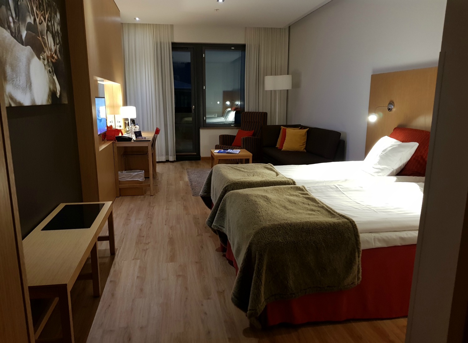 View across a Superior room at hotel Levi Panorama including twin beds and small living area - my review of Hotel Levi Panorama, Lapland