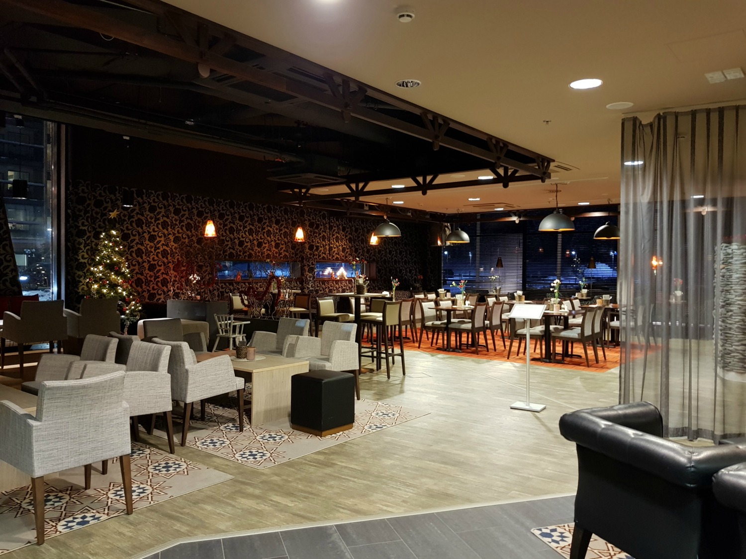 View across the bar area with tables at the hotel - my review of Hotel Levi Panorama, Lapland
