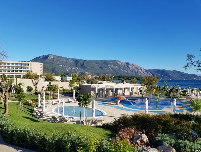 View across the Sky side of Ikos Dassia resort including two kids pools and splash zone - my review of Ikos Dassia with kids, a family holiday in Corfu