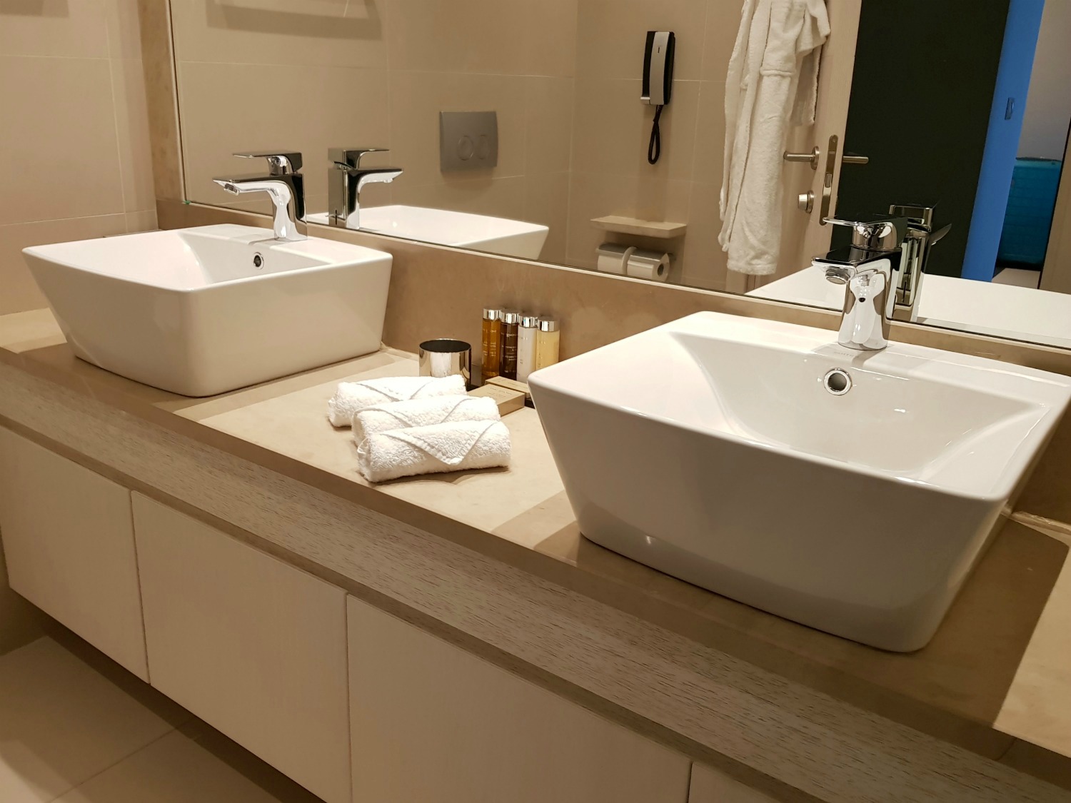 Two sinks in the bathroom in our Junior suite at Ikos Dassia - my review of Ikos Dassia with kids, a family holiday in Corfu
