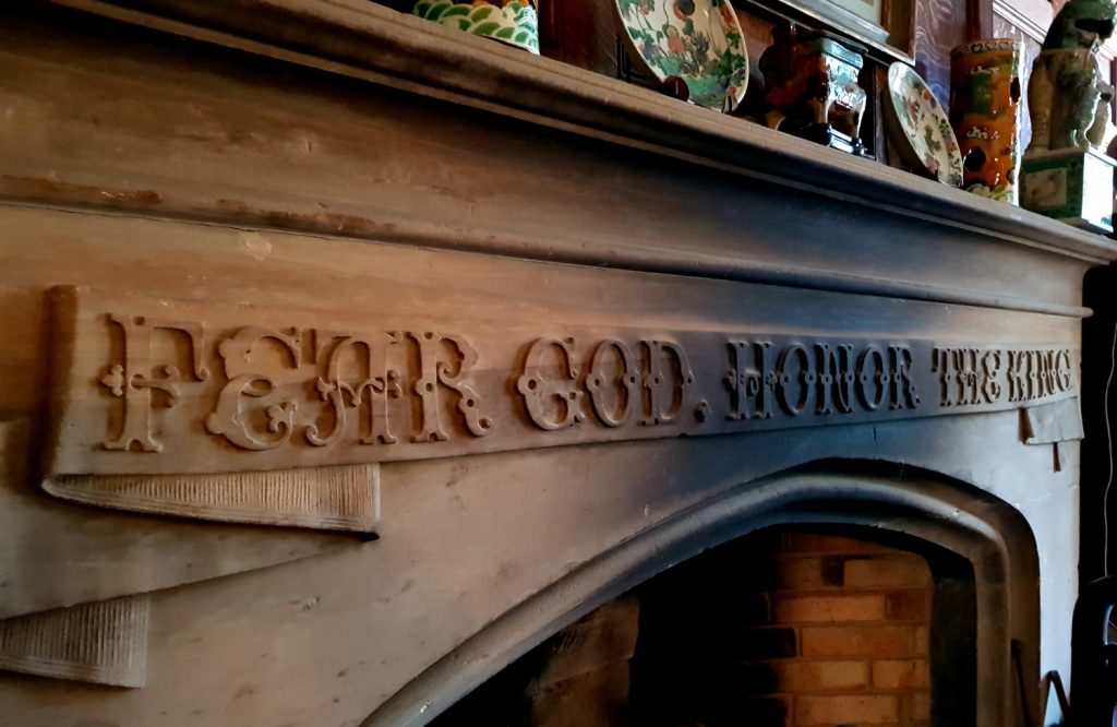 Carving over the fireplace at the 19th century house at Scotney Castle, Kent - our winter day out at Scotney Castle with kids