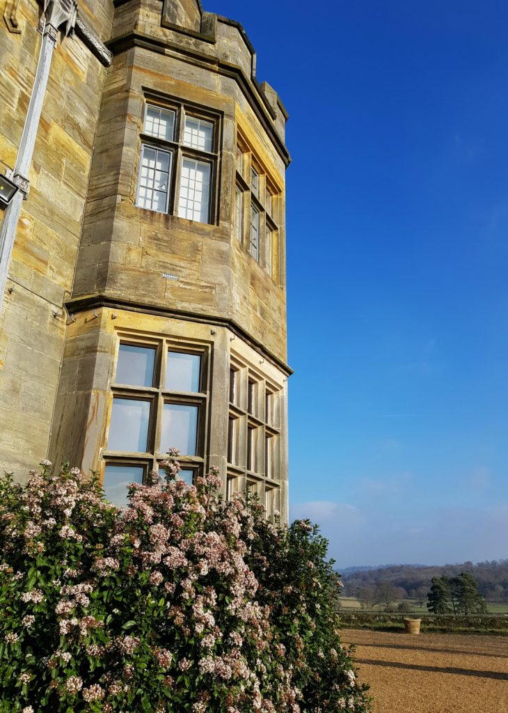 Rear of the 19th century house at Scotney Castle in Kent, with hydrangeas - our winter day out at Scotney Castle with kids