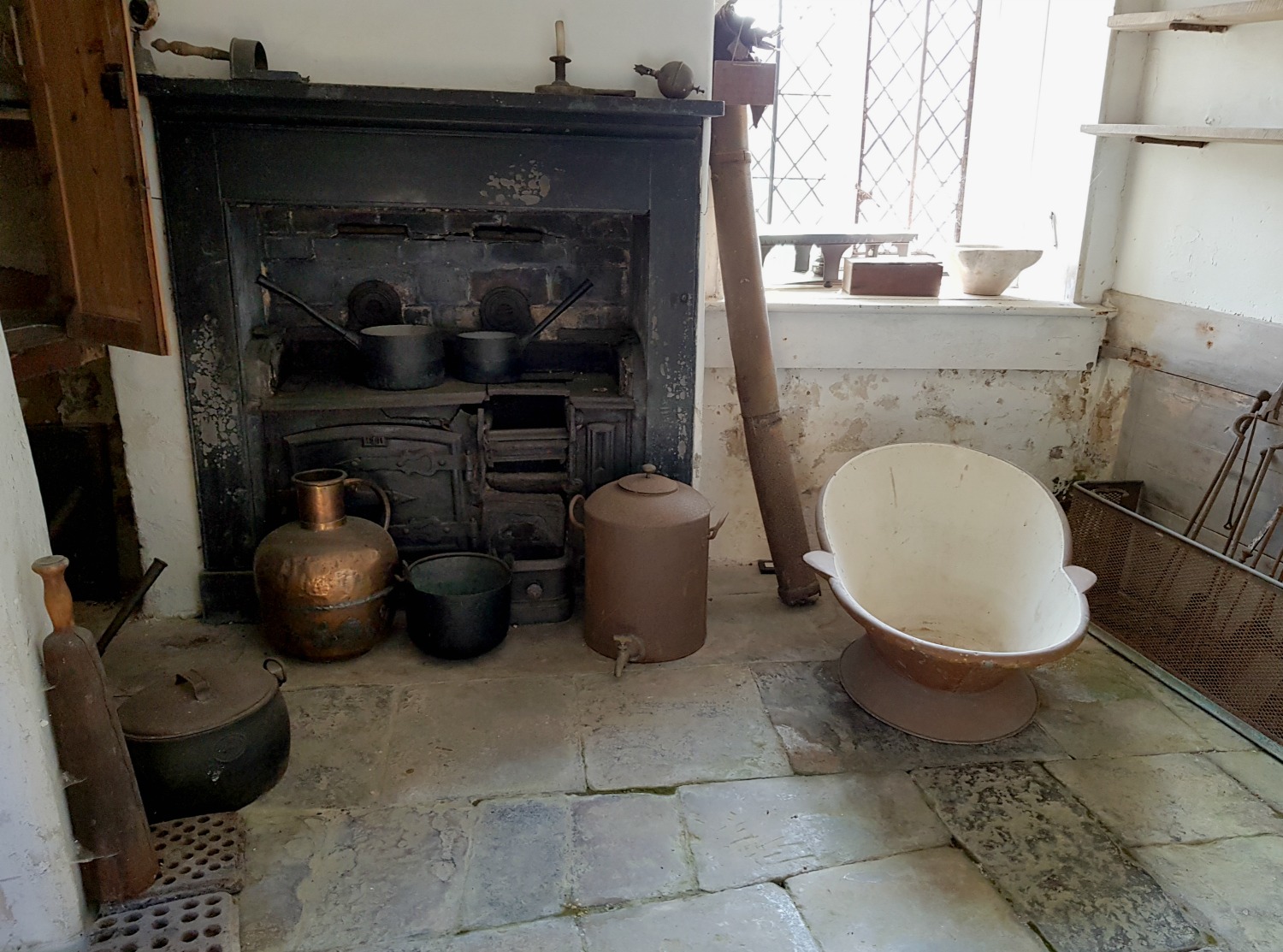 One of the rooms at Scotney Castle, Kent, including an old-fashioned hip bath - our winter day out at Scotney Castle with kids