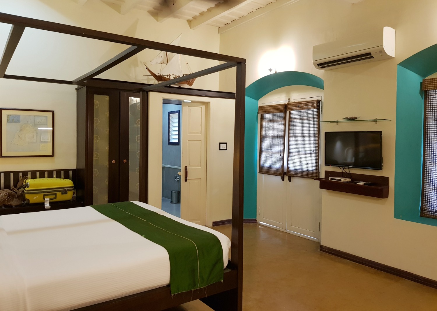 Mauritius room at the Tea Bungalow in Fort Kochi with four-poster bed - my one week in Kerala itinerary, including Kerala with kids