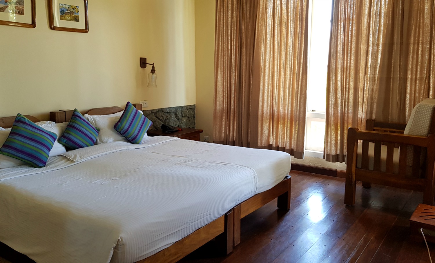 Huge bed in one of the rooms at Windermere Estate in Munnar in the hills of Kerala - my one week in Kerala itinerary, including Kerala with kids