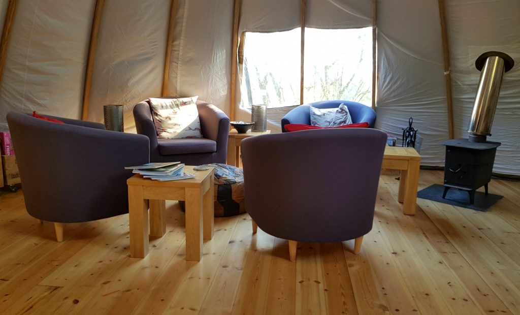 Comfortable chairs in the communal tent - my Penhein glamping review