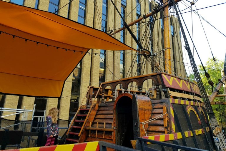 Looking onto the Golden Hinde in London with my daughter on deck - our experience on the Golden Hinde sleepover