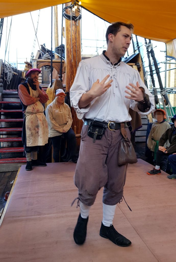 The master gunner on deck of the Golden Hinde in London, a replica of Sir Francis Drake's ship