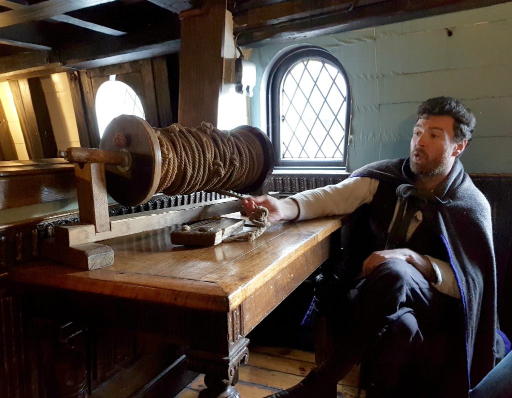 The master with the knotted rope that's the origin of measuring speed in knots, on board the Golden Hinde
