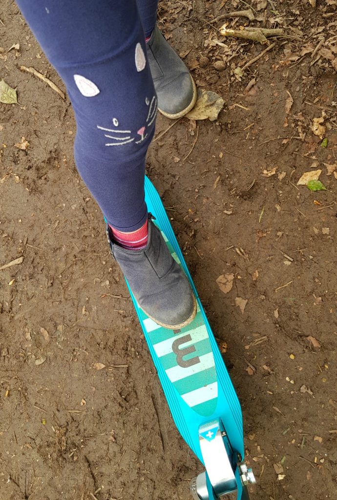 My daughter's foot on her Micro Sprite scooter