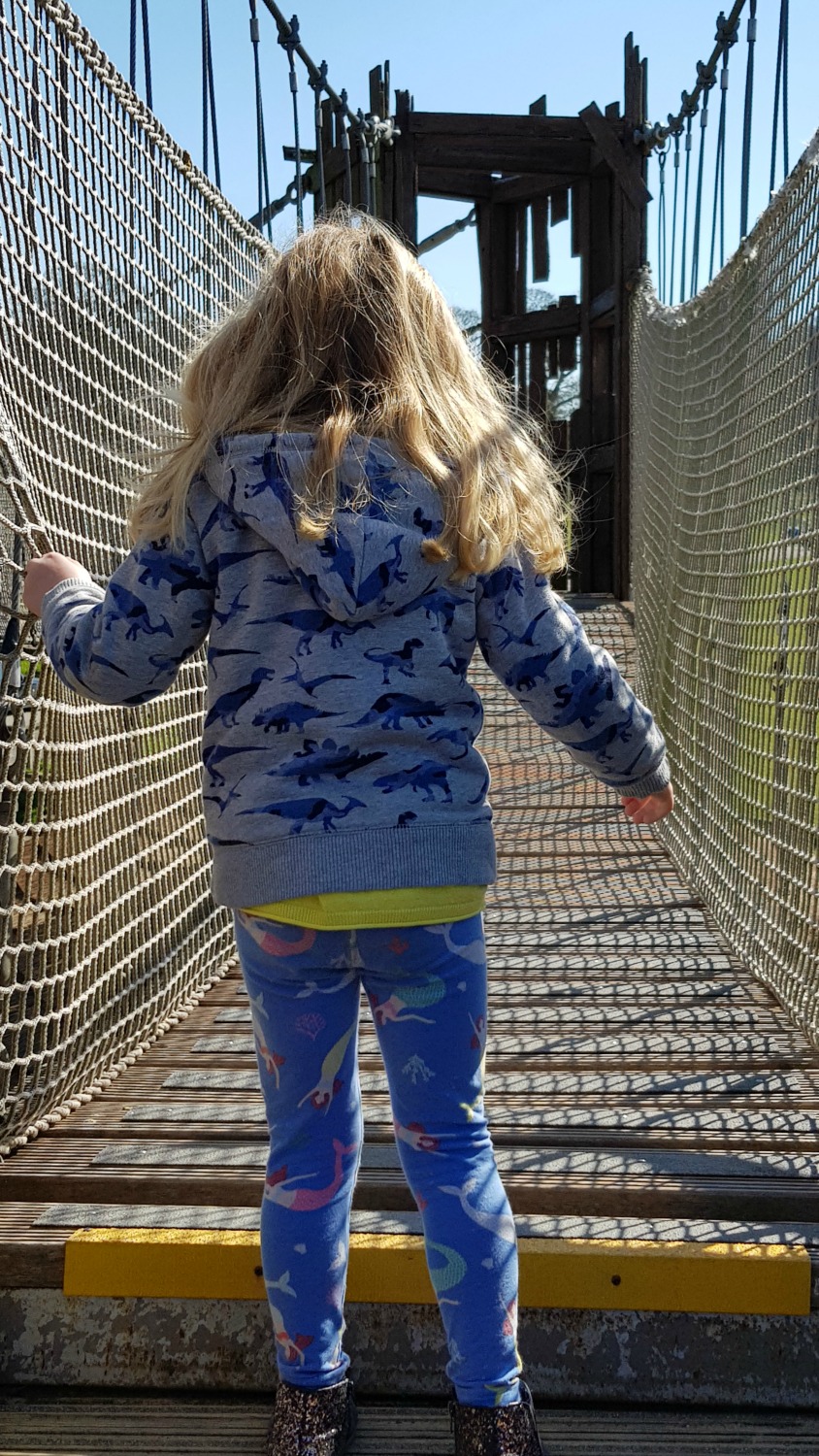 My daughter walks across one of the high rope walkways at the African Village, before heading into Longleat Safari drive-through on our visit to check our the new Koala Creek at Longleat