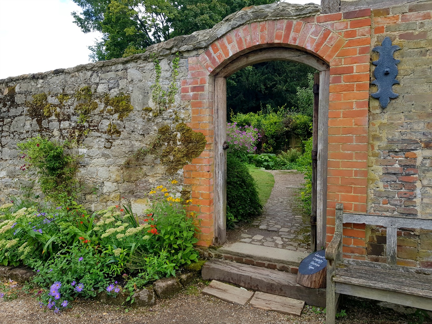 Doorway in the wall leading to the Laundry Cottage at Ightham Mote, Kent