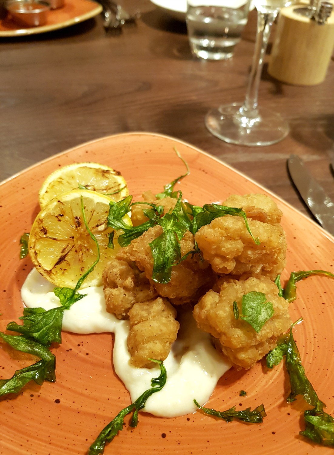 Plate of calamari at dinner in the Collage restaurant of Radisson Blu Birmingham hotel