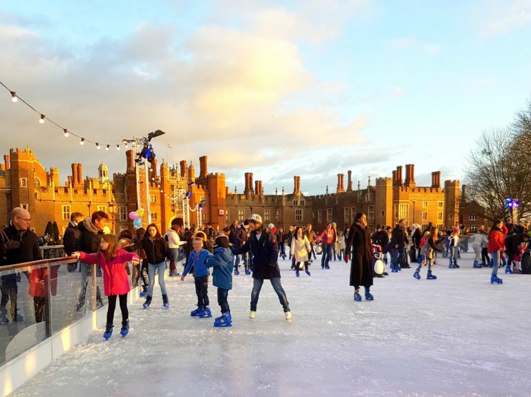 People skating on the ice rink in front of Hampton Court Palace - our review of the Christmas ice rink at Hampton Court