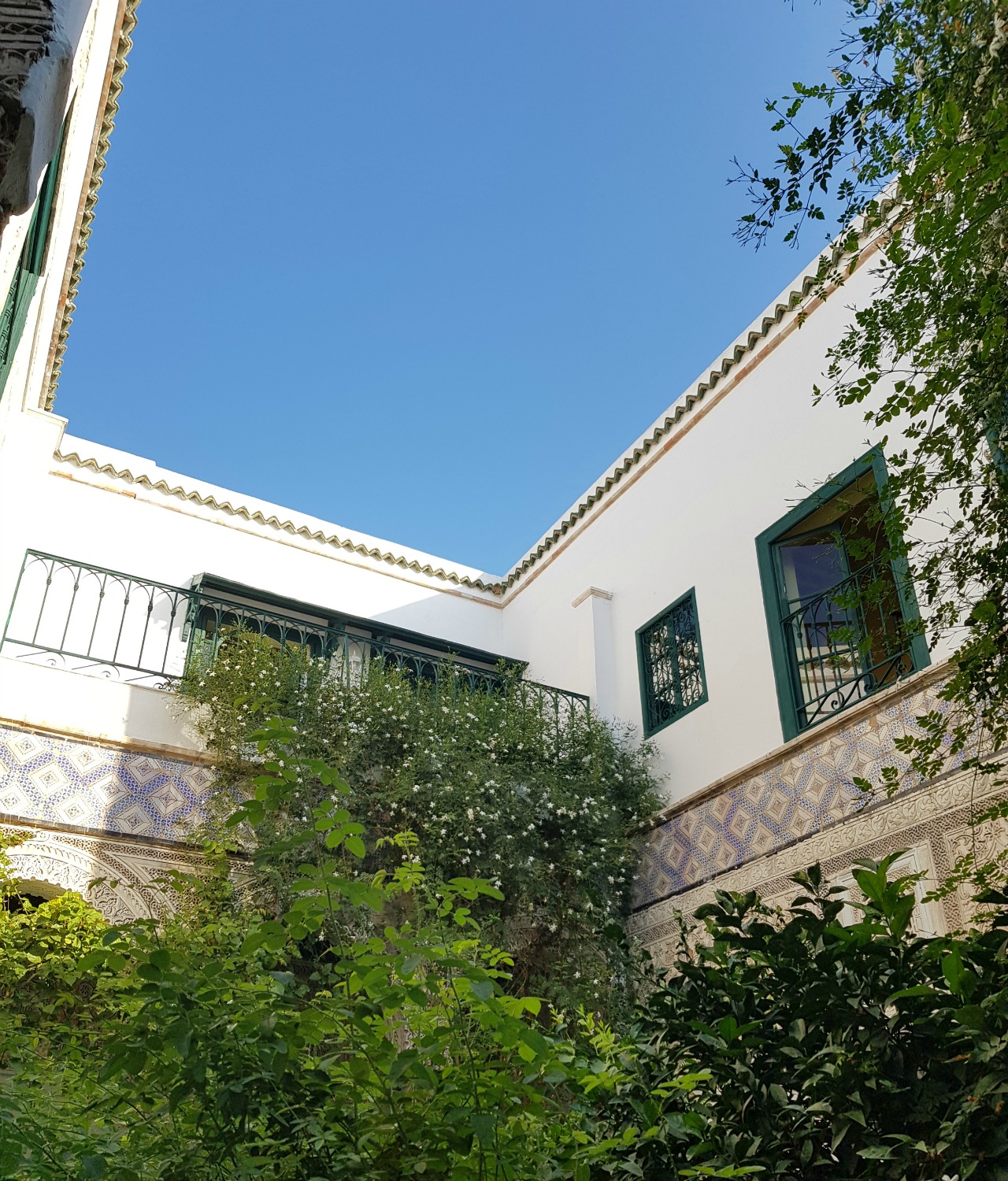 View up from the garden to the little terrace by the breakfast room of Palais Bayram - my hotel review