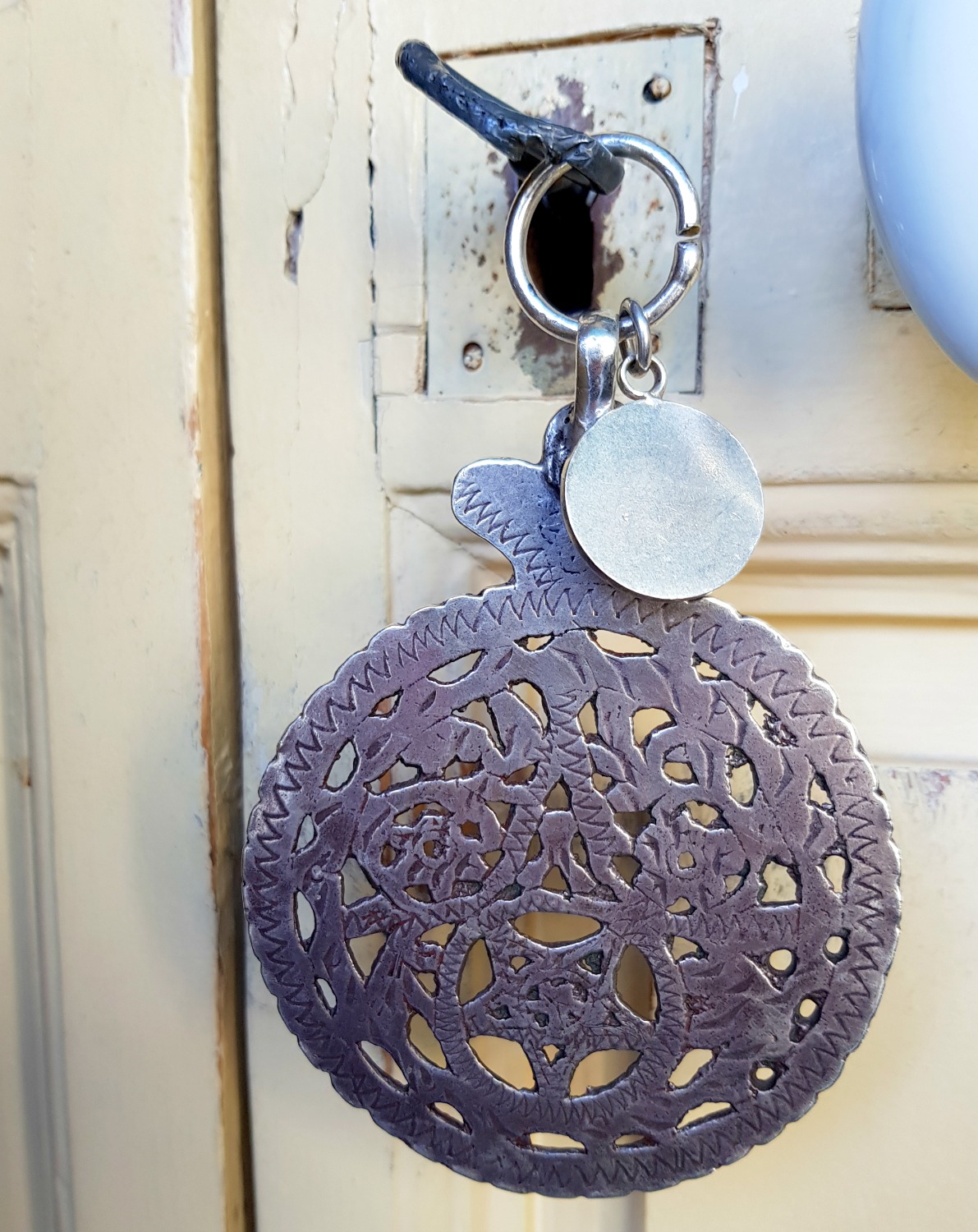 Decorative metal key ring on the key for one of the grand historic suites at Palais Bayram boutique hotel - my review of Palais Bayram in Tunis