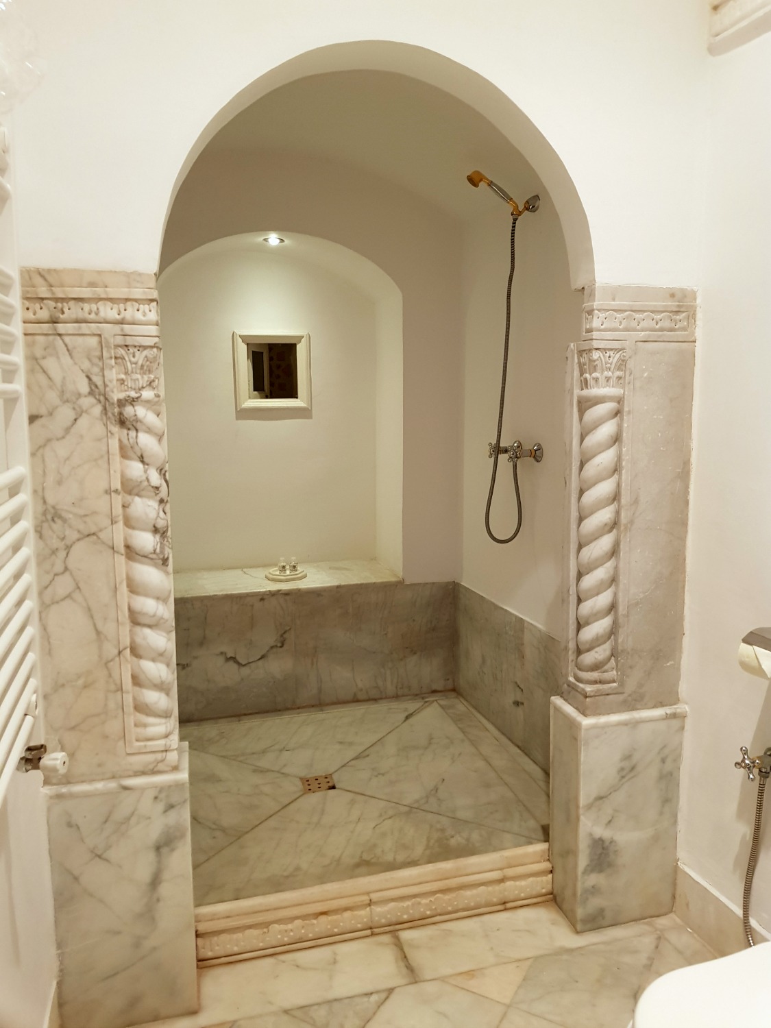 The marble alcove for the shower in one of the grand historic suites at Palais Bayram boutique hotel - my review of Palais Bayram in Tunis