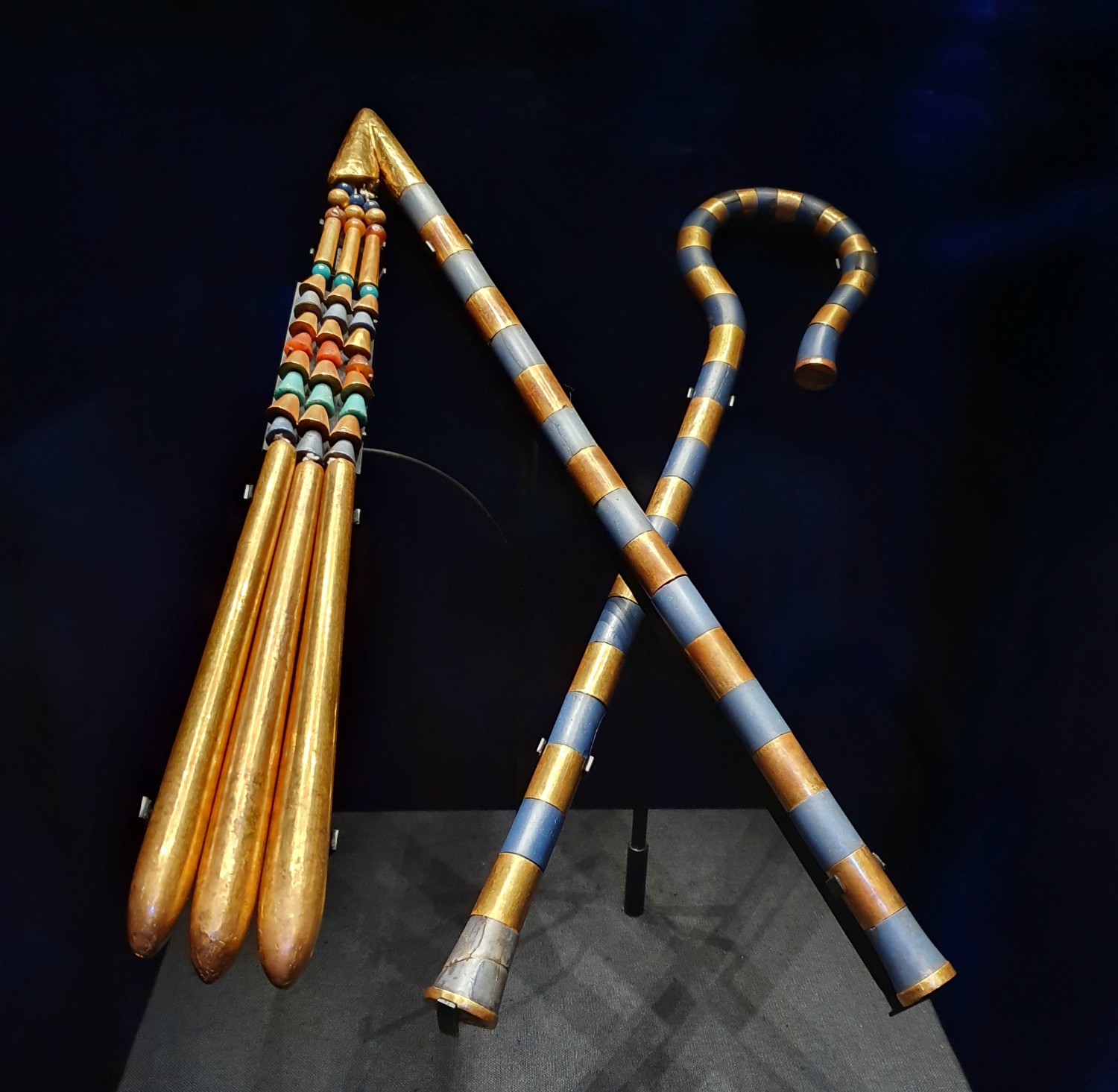 Golden flail and crook buried in Tutankhamun's hands - one of the artefacts on display at the Treasures of the Golden Pharaoh exhibition in London