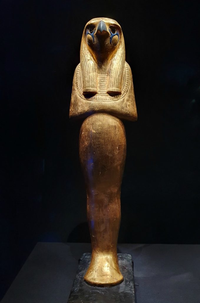 Statue of Egyptian hawk headed god Horus at the London Tutankhamun exhibition