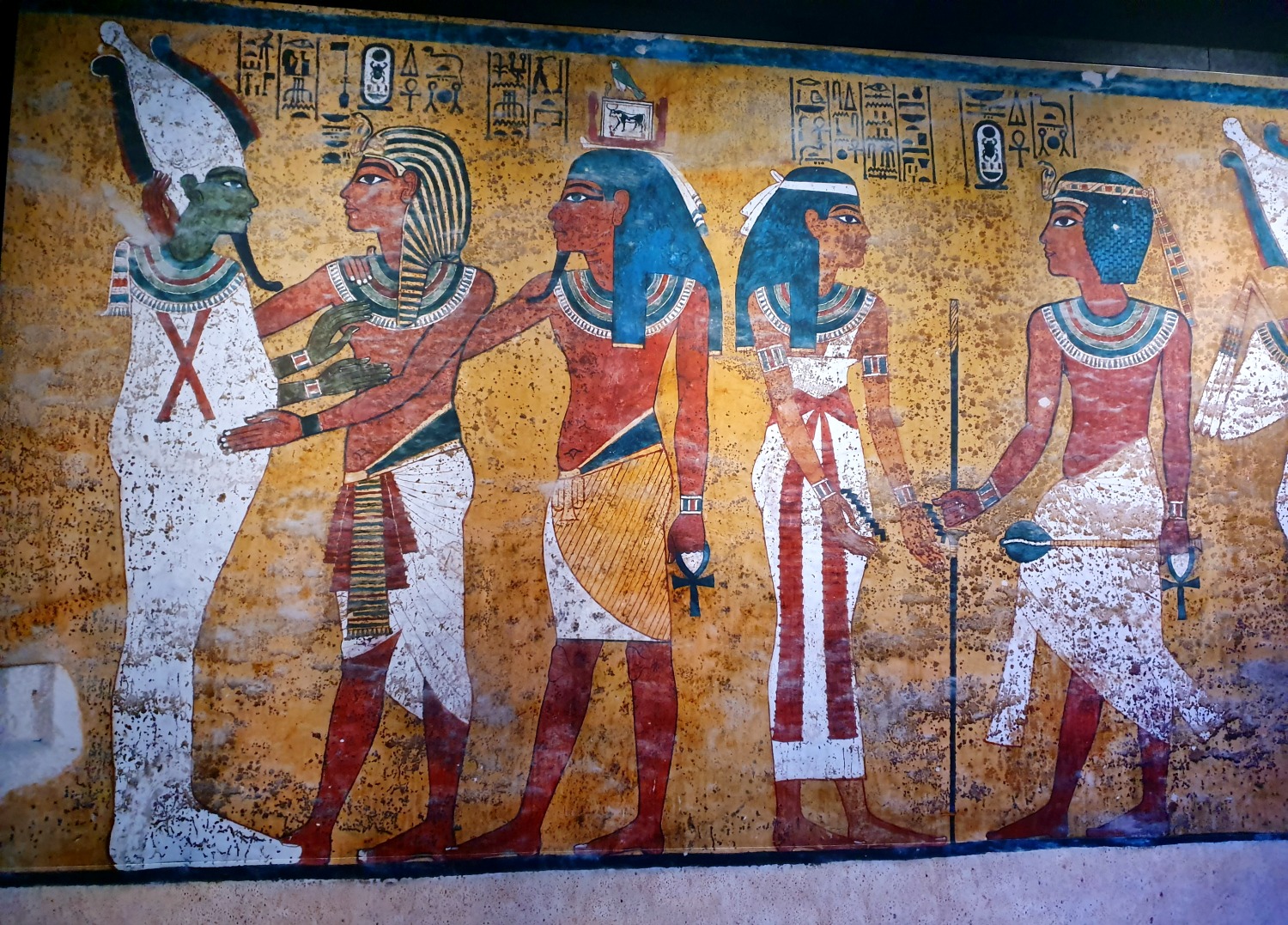 Reproduction of a wall painting showing an ancient Egyptian scene at the Tutankhamun exhibition in London