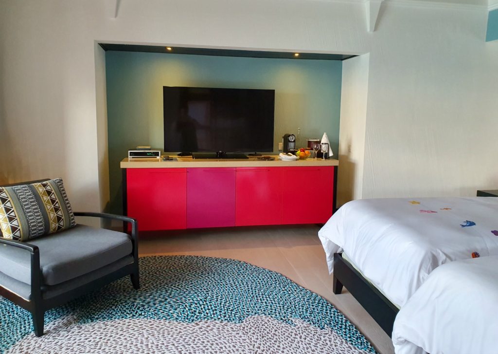 Living space in the bedroom of our our overwater villa at Four Seasons Kuda Huraa in the Maldives
