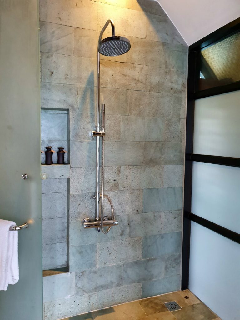 Shower in the bathroom of our water villa in the Maldives at Kuda Huraa resort