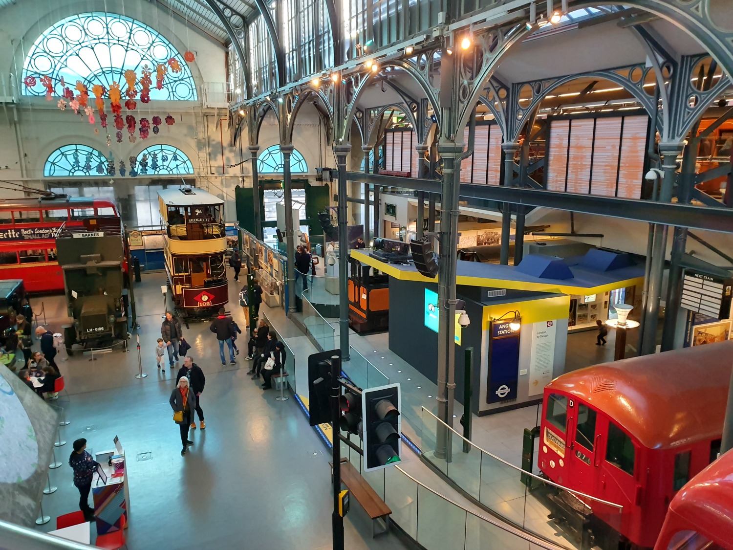 View of some of the vintage vehicles in the main hall of the London Transport Museum - a visit to check out the London Transport Museum Christmas events