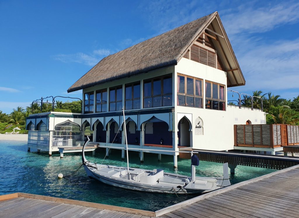 View of Al Barakat restaurant on the waterfront by the jetty at Landaa Giraavaru resort in the Maldives