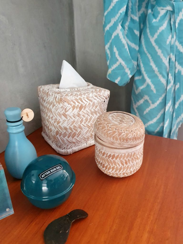 Toiletries and robe in the bathroom of our Landaa Giraavaru beach villa in the Maldives