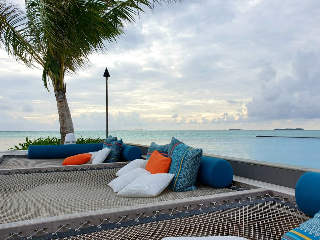 Nets with cushions above the water at the bar by Blu restaurant - one of several at Landaa Giraavaru resort in the Maldives