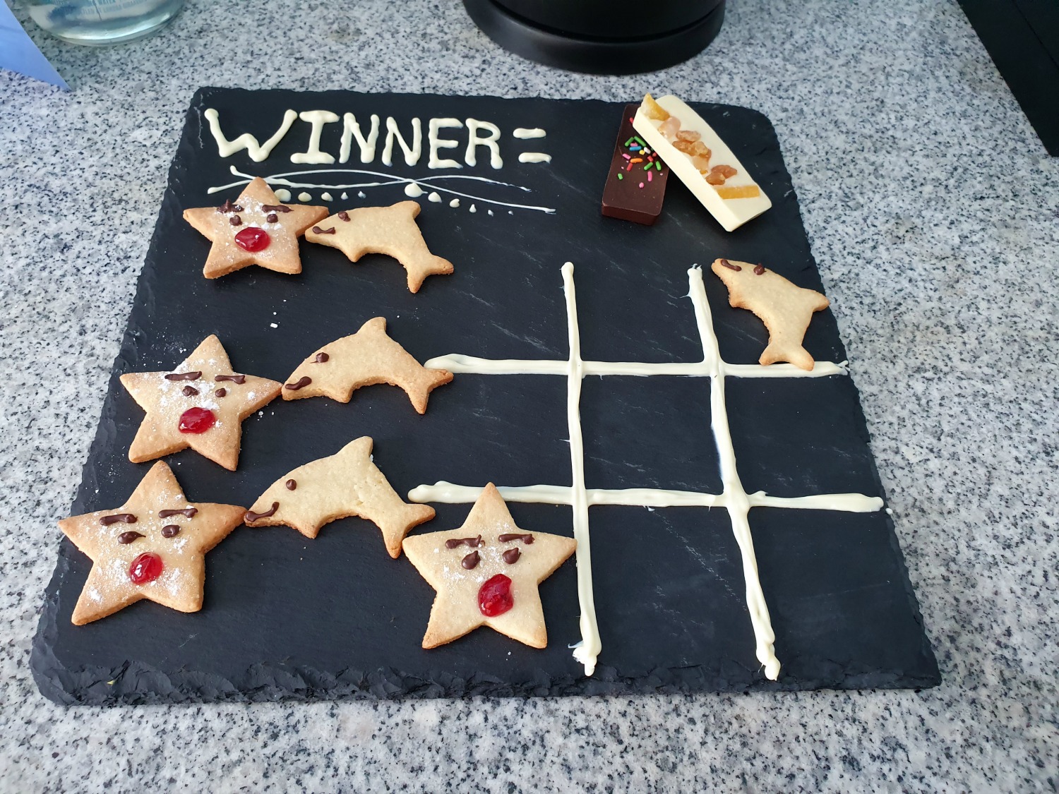 Noughts and crosses game made of biscuits in our villa at Landaa Giraavaru resort in the Maldives