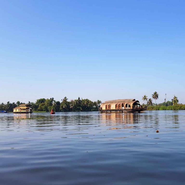 Houseboat on the backwaters of Alleppey in Kerala Beautiful view of Odayam beach near ocean and palm trees in Varkala, Kerala, India