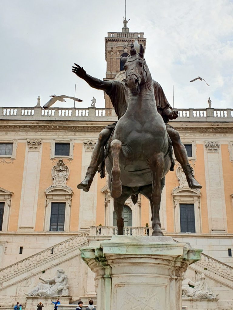 Statue of the Roman emperor Marcus Aurelius on his horse in the Campidoglio square designed by Michaelangelo