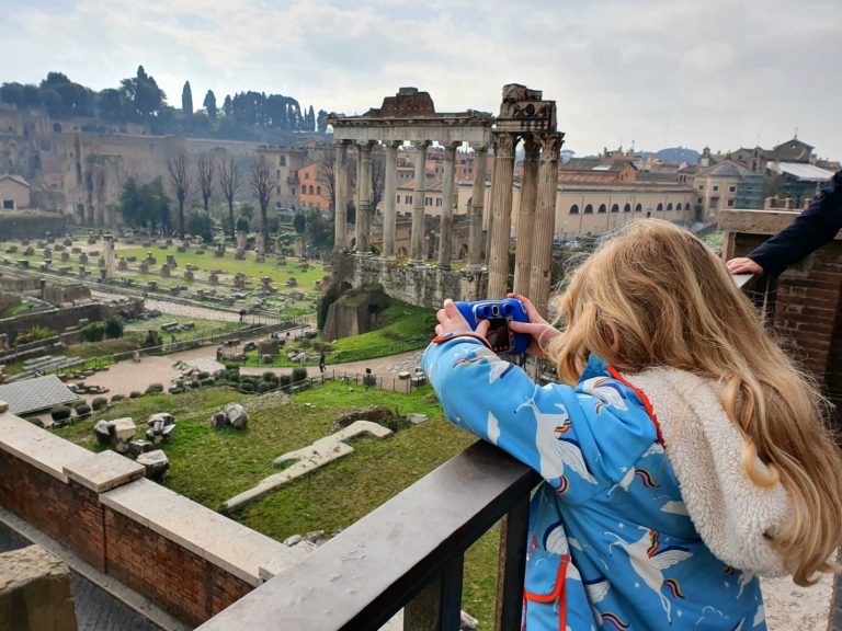 My daughter looks out over the buildings of the Roman Forum during our Tapsy Tour of Rome - my review