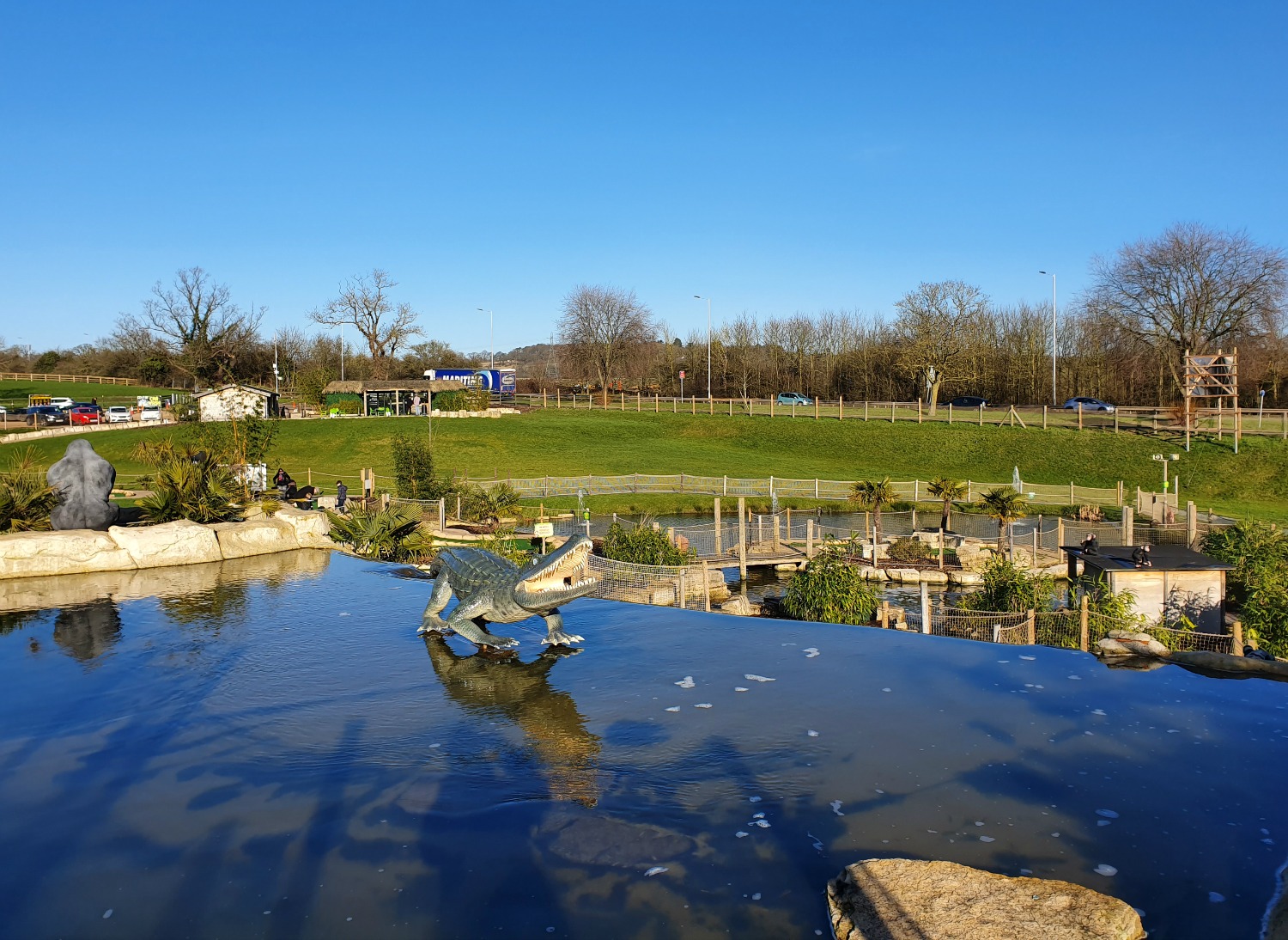 Crocodile in the middle of the Amazon course at Lost Jungle London - visiting Lost Jungle adventure golf, Europe's biggest adventure golf course