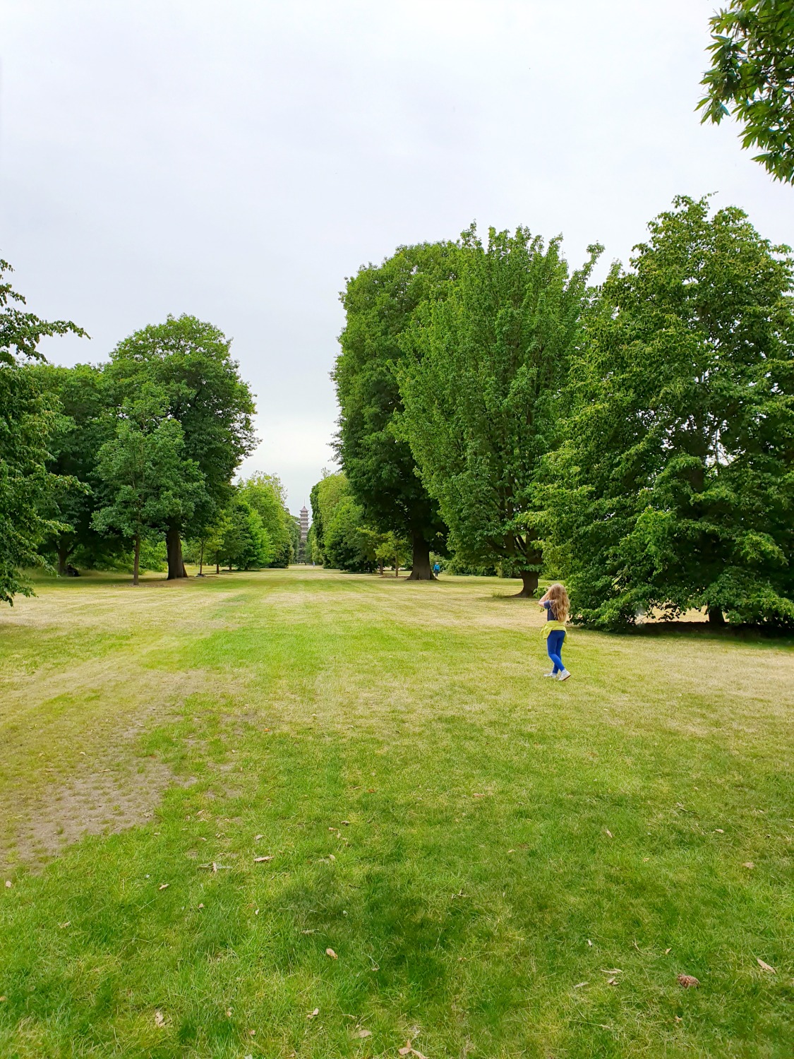 My daughter runs along Pagoda Vista towards the pagoda at Kew Gardens, with no other people in sight