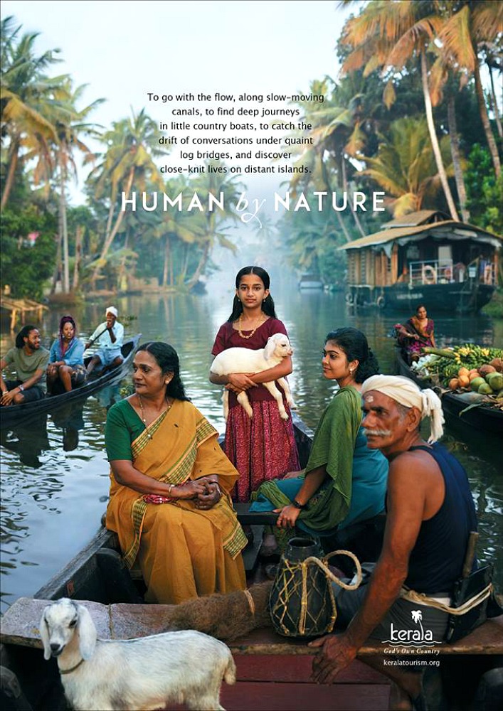 Poster from the Kerala Tourism campaign Kerala, Human By Nature, showing woman in a boat on the backwaters