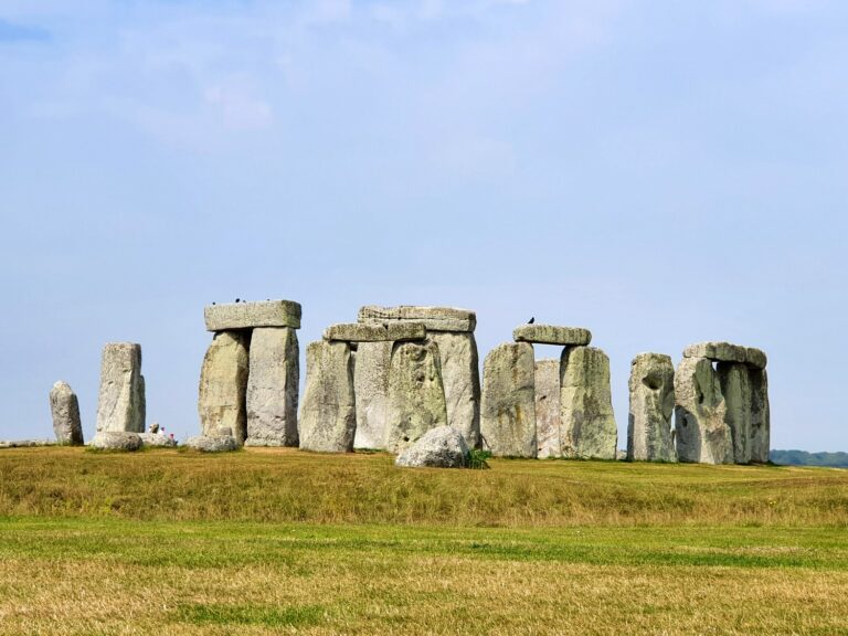 View of Stonehenge Neolithic stone circle in Wiltshire, UK - a family visit to Stonehenge after lockdown