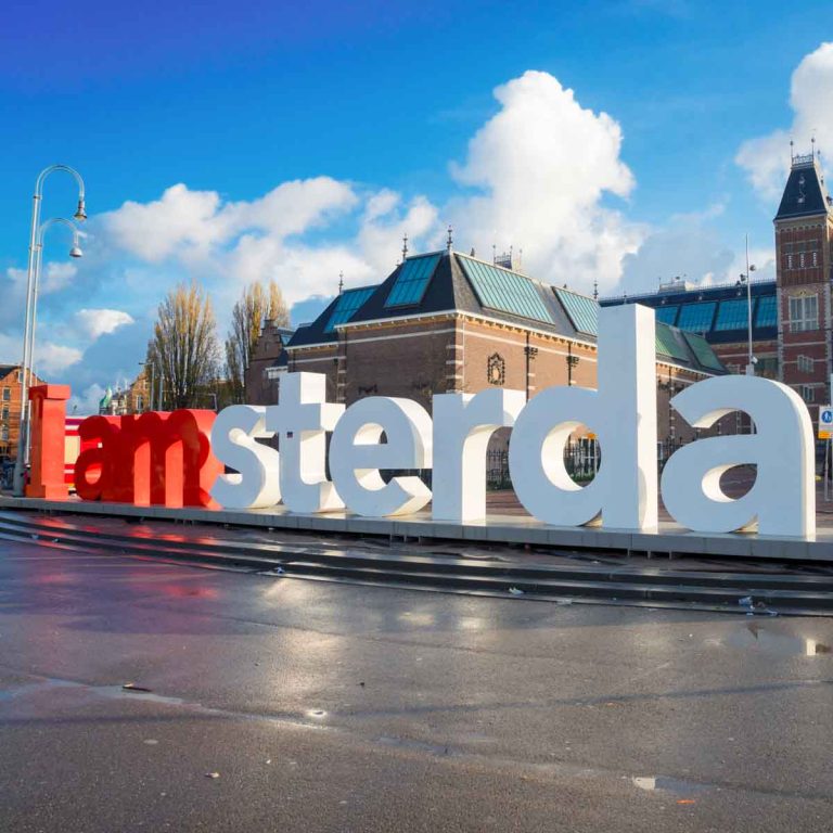 The I amsterdam sign and Rijksmuseum on a sunny day - my tips on the best things to do in Amsterdam with toddlers