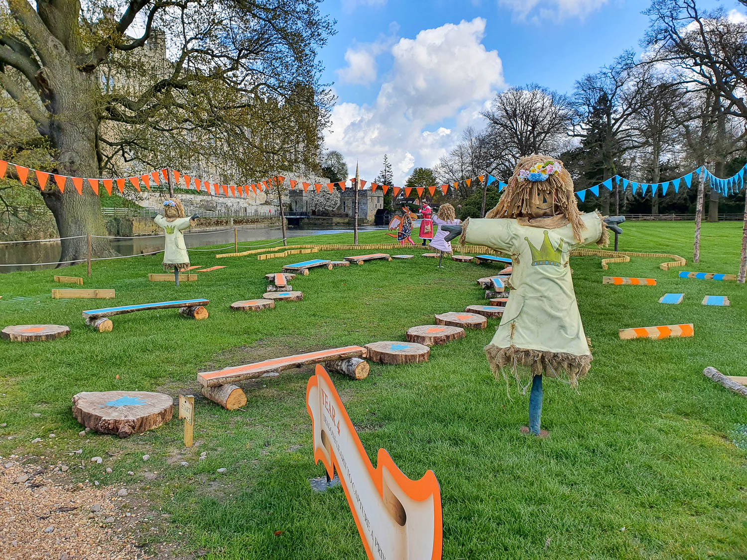 My daughter walks around the activity course on the Zog trail at Warwick Castle to 'capture' a princess, with the actor playing the princess - my review of the Warwick Castle Zog trail