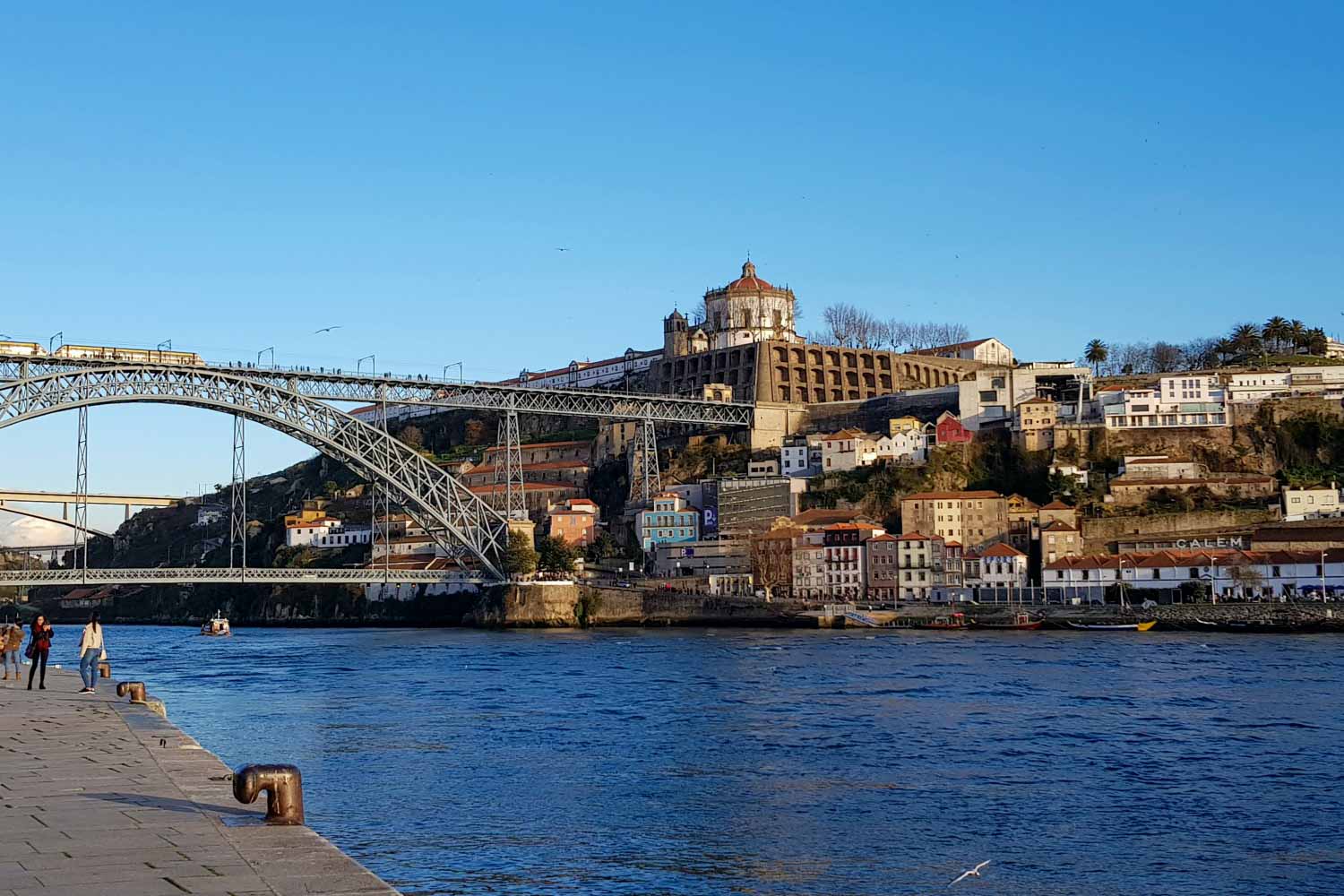 View across the River Douro from Porto to Vila Nova de Gaia - my pick of the top things to do in Porto with kids, discovering the family-friendly side to this lovely city in north Portugal