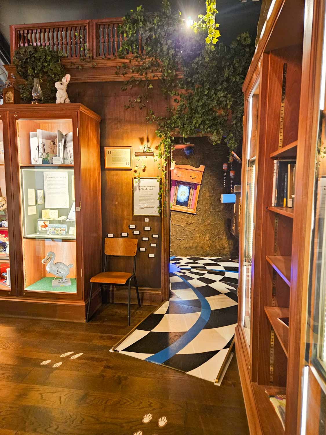 View from the corridor into the Alice in Wonderland-themed room at the Oxford Story Museum