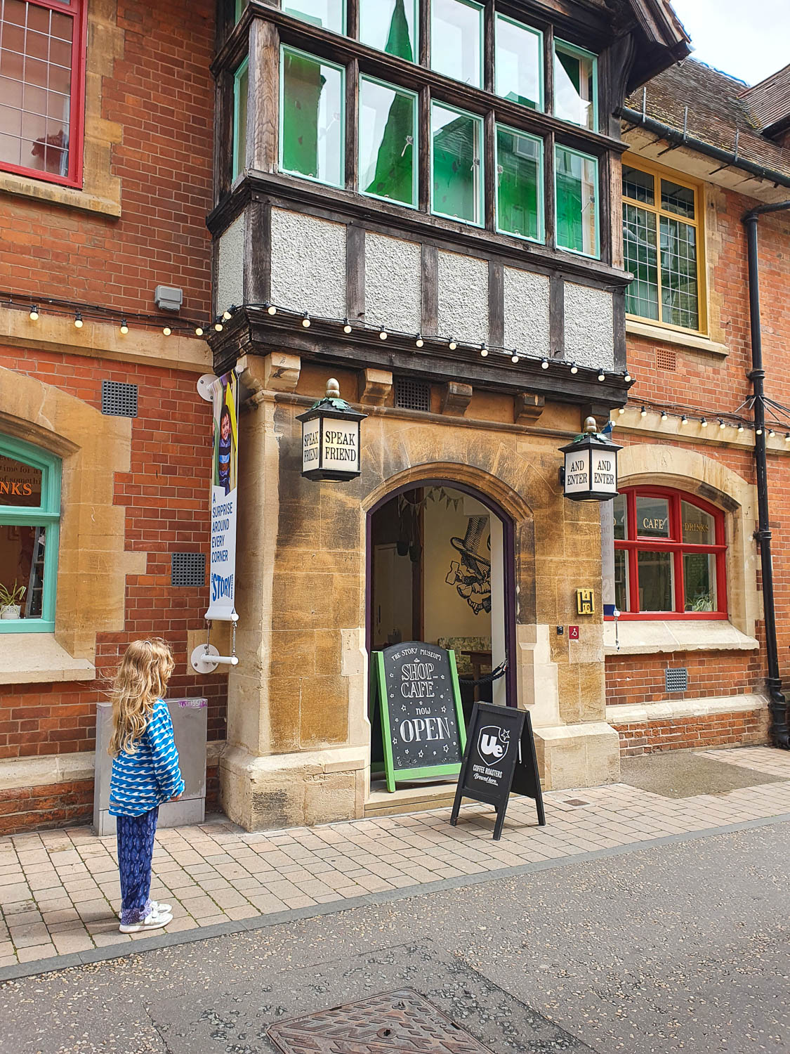 My daughter at the entrance to the Story Museum in Oxford - my Story Museum review after a day out exploring