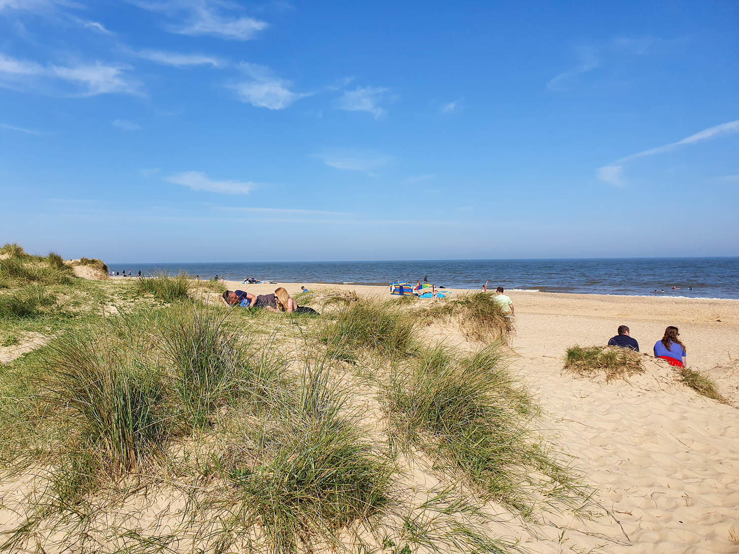 View of the sand dunes and sea at the beach near Southwold harbour in Suffolk