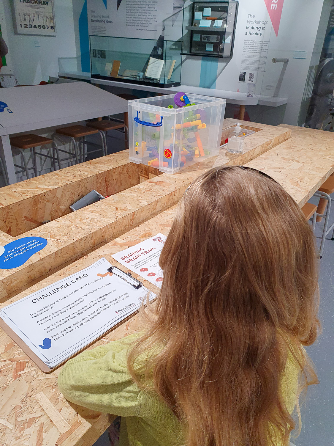 My daughter tries one of the challenges at the Thackray Museum, Leeds, to design your own medical device using block and lego - my Thackray Museum review