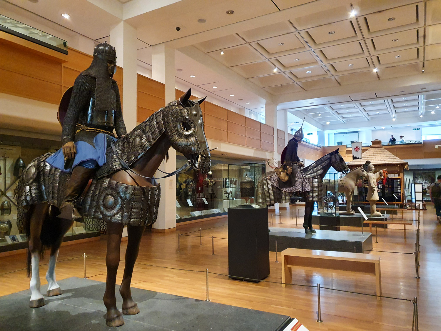 View across the Oriental gallery, including armoured horses with displays from India, China and Japan - my review of a visit to the Royal Armouries with kids