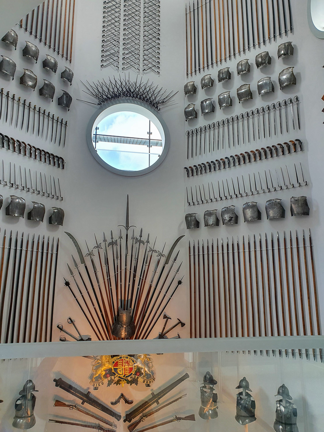 View of part of the Hall of Steel with countless weapons and pieces of armour displayed in the staircase leading between the galleries during a visit to the Royal Armouries with kids