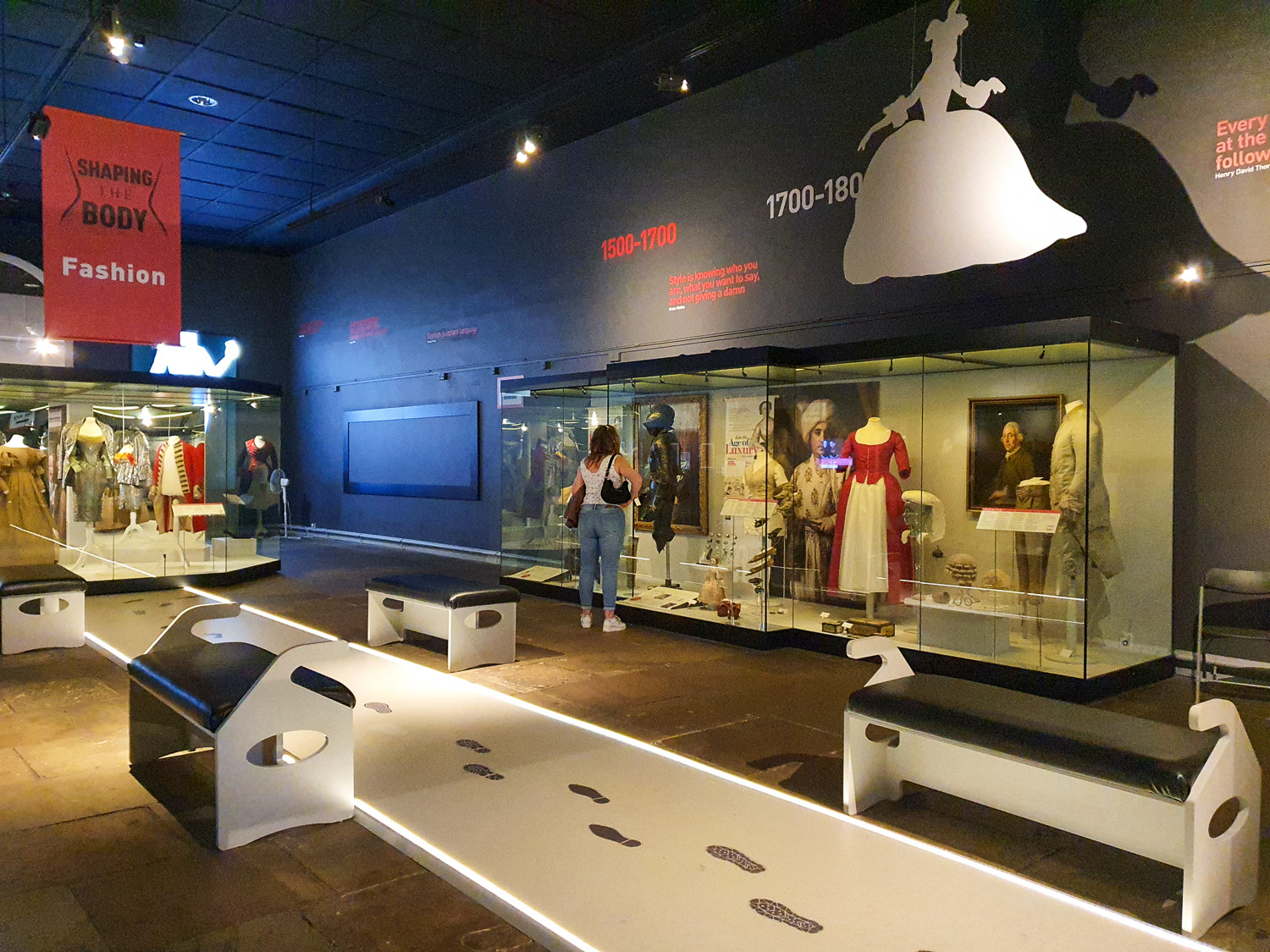 The fashion exhibition at York Castle Museum with a catwalk down the centre of the room and fashions shown from 1500 to 1800 - my York Castle Museum review