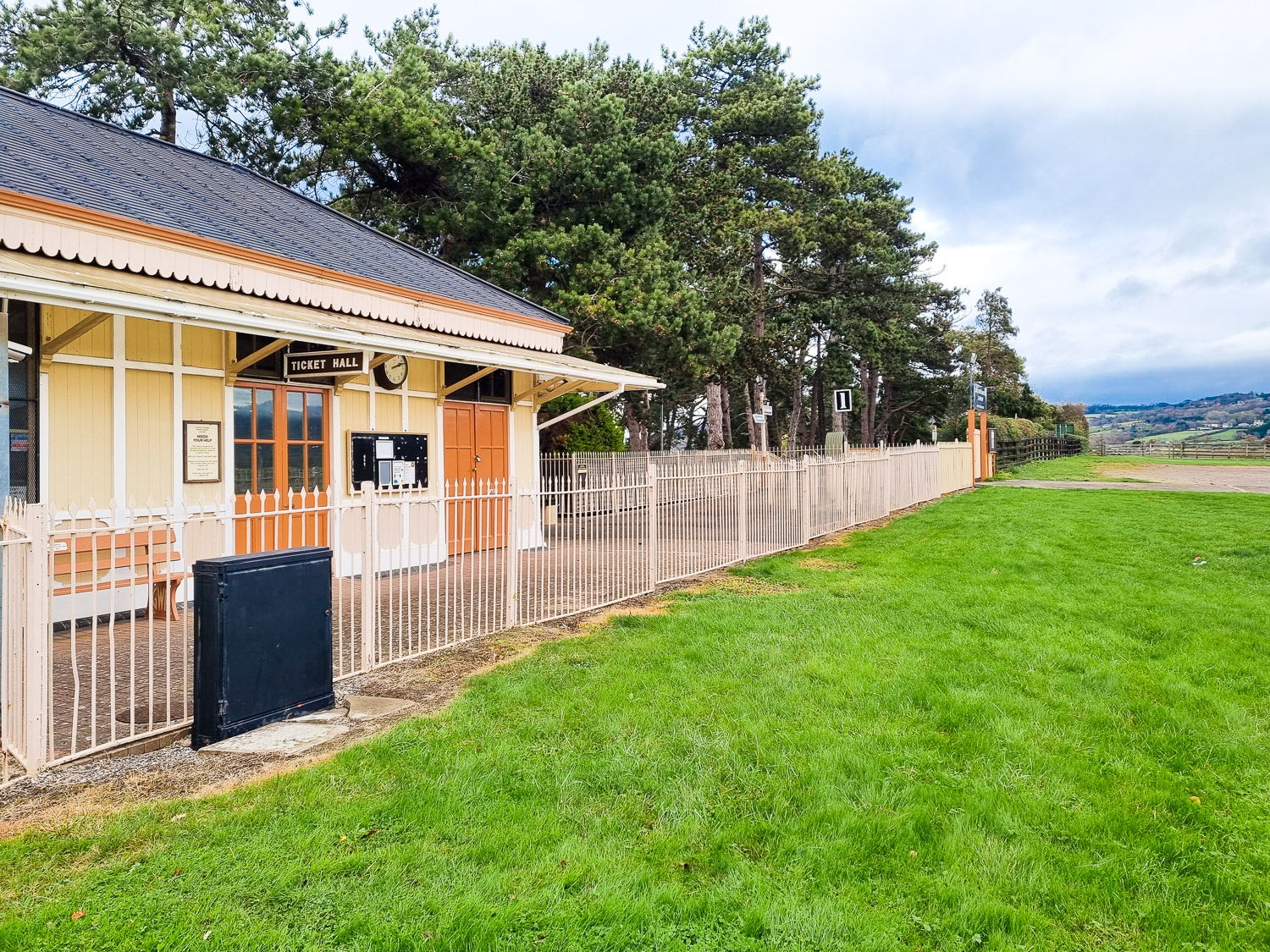 View of the ticket hall and station of the Gloucestershire and Warwickshire steam railway on a cloudy day - one of my top things to do in Cheltenham with kids if you want to see some of the Cotswolds